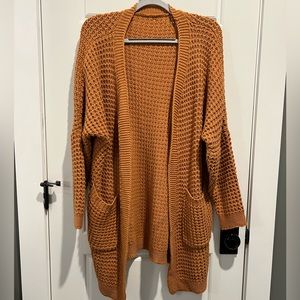 Rust colored knit oversized cardigan